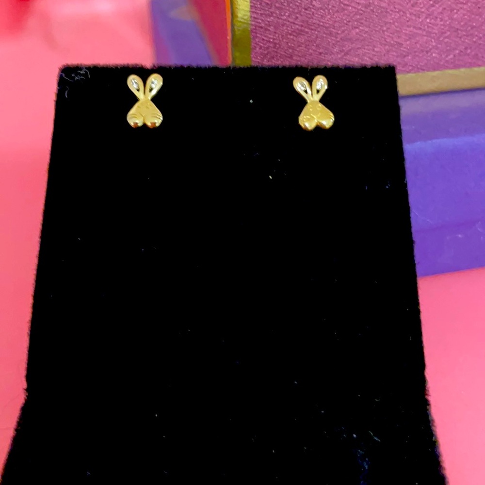 14 KT yellow gold CZ accent bunny earrings. Never worn.